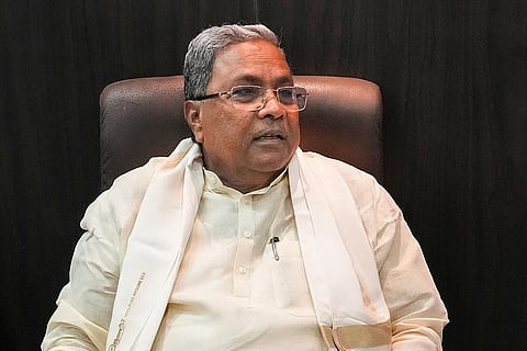 CM siddharamaiah giving first dose to November kra